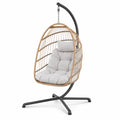Chaise suspendue en rotin avec coussin en polyester et support en acier